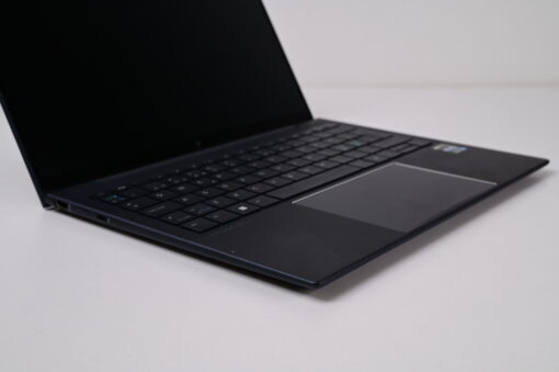 Left angle view of HP Elite Dragonfly G3 showing ports and keyboard